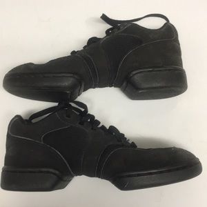 Black cheer/dance shoe with flexible arch for stunting and dancing.